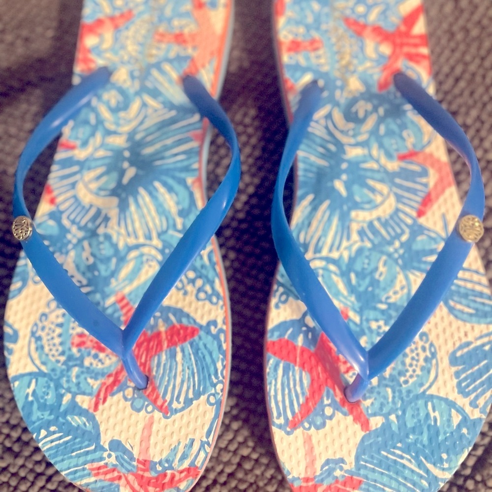 Lilly Pulitzer flip flops.  Very slightly used.  Size L (9-10)